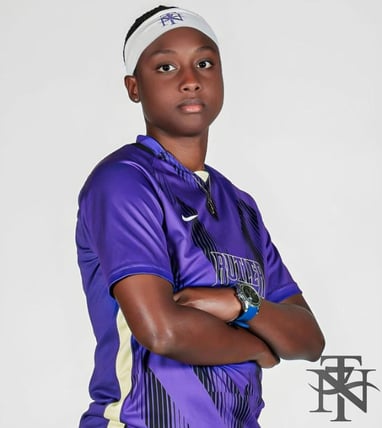 Tyeesha Nelson appears in her sports uniform, she looks directly at the camera.