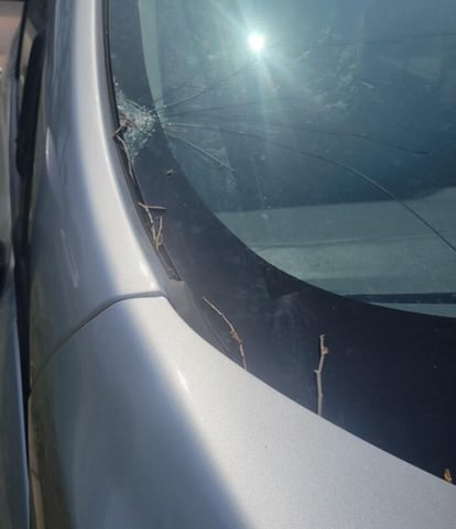 Cracked windshield after storm.
